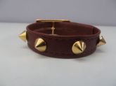 Cód:PS34- Pulseira Couro com Spikes Dourados